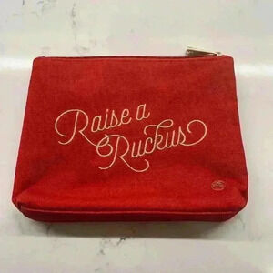 Red Make-up Linen Bag with Gold Zipper and Hardware 'Raise a Rukus' embroidery